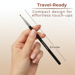 Hand holding a Mommy Makeup Pointed Eyeliner Brush with text about its travel-ready design on a beige background